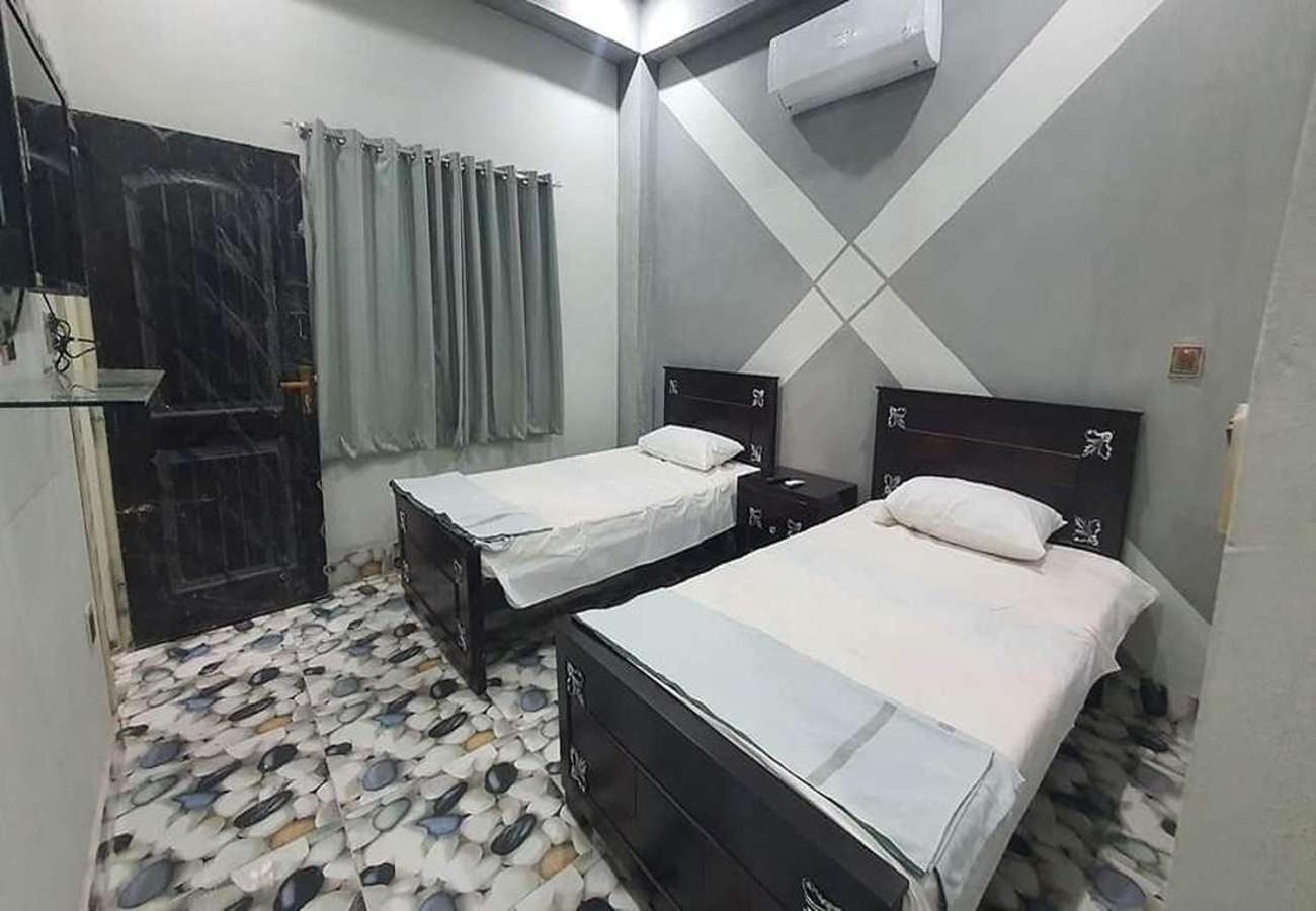 Al Qadir Residence Multan Esterno foto