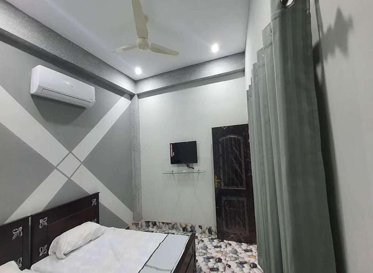 Al Qadir Residence Multan Esterno foto