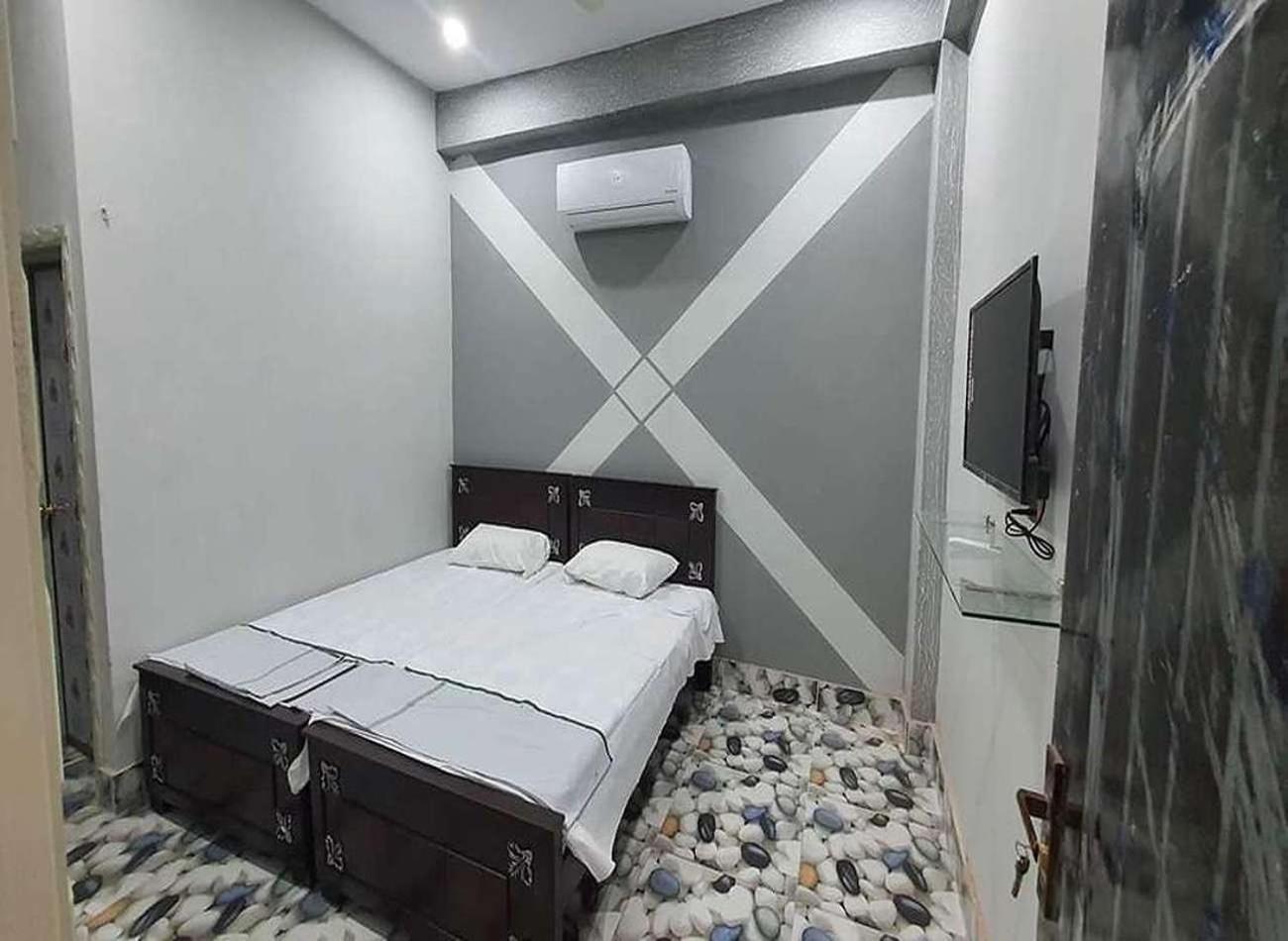 Al Qadir Residence Multan Esterno foto